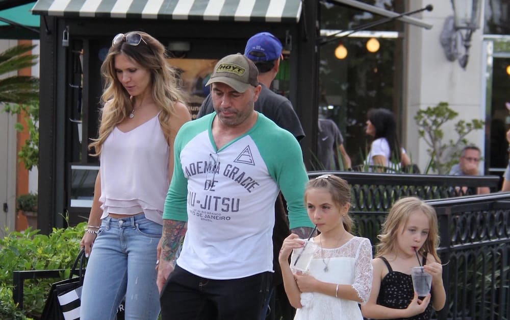 Jessica Ditzel and Joe Rogan with their two daughters