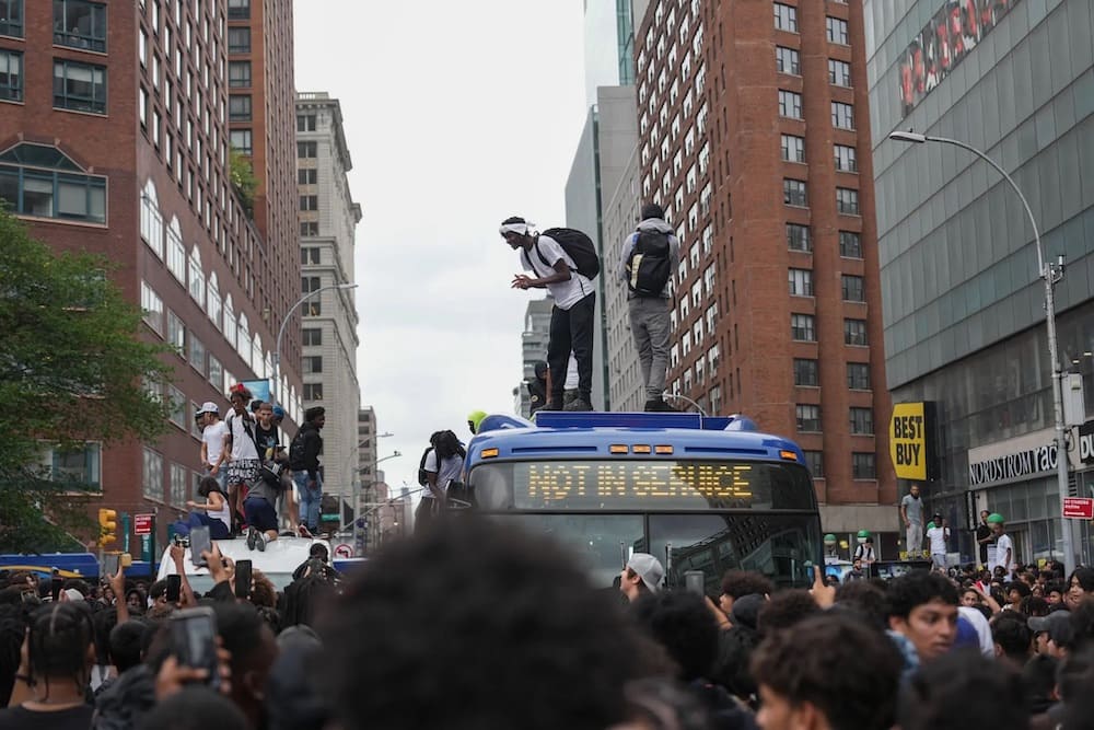 Rioters seen destroying public transportation vehicles
